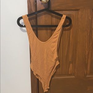 Burnt yellow bodysuit